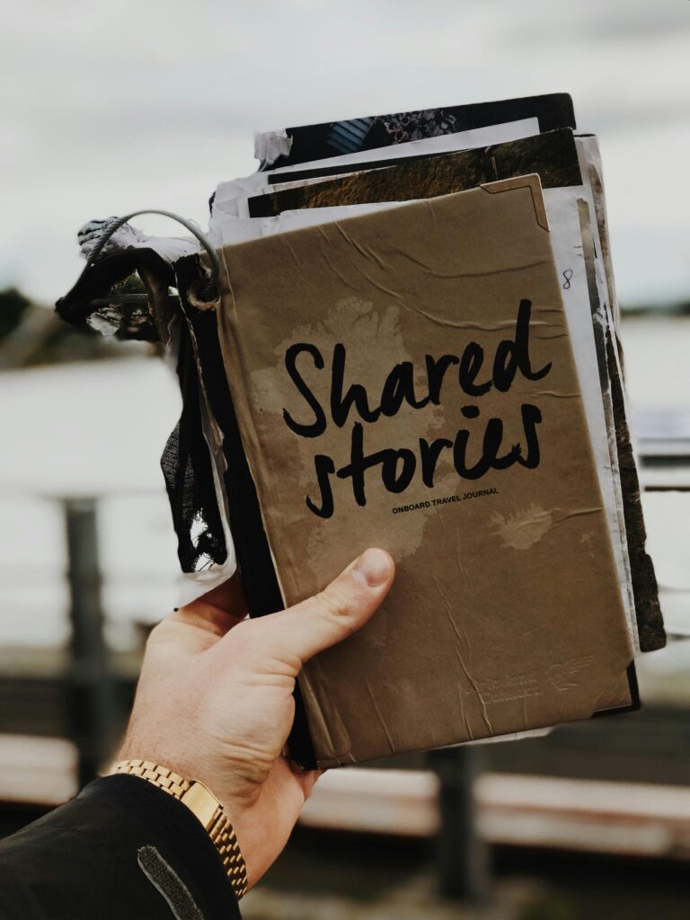 Photo Of Person Holding Book